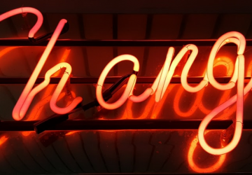 Photograph of a neon sign saying Change