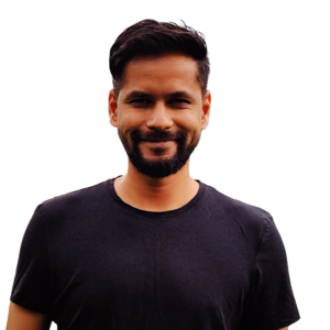 Head and Shoulder Photograph of Nishith Shah, Nishith is smiling and casually dressed in a black t shirt